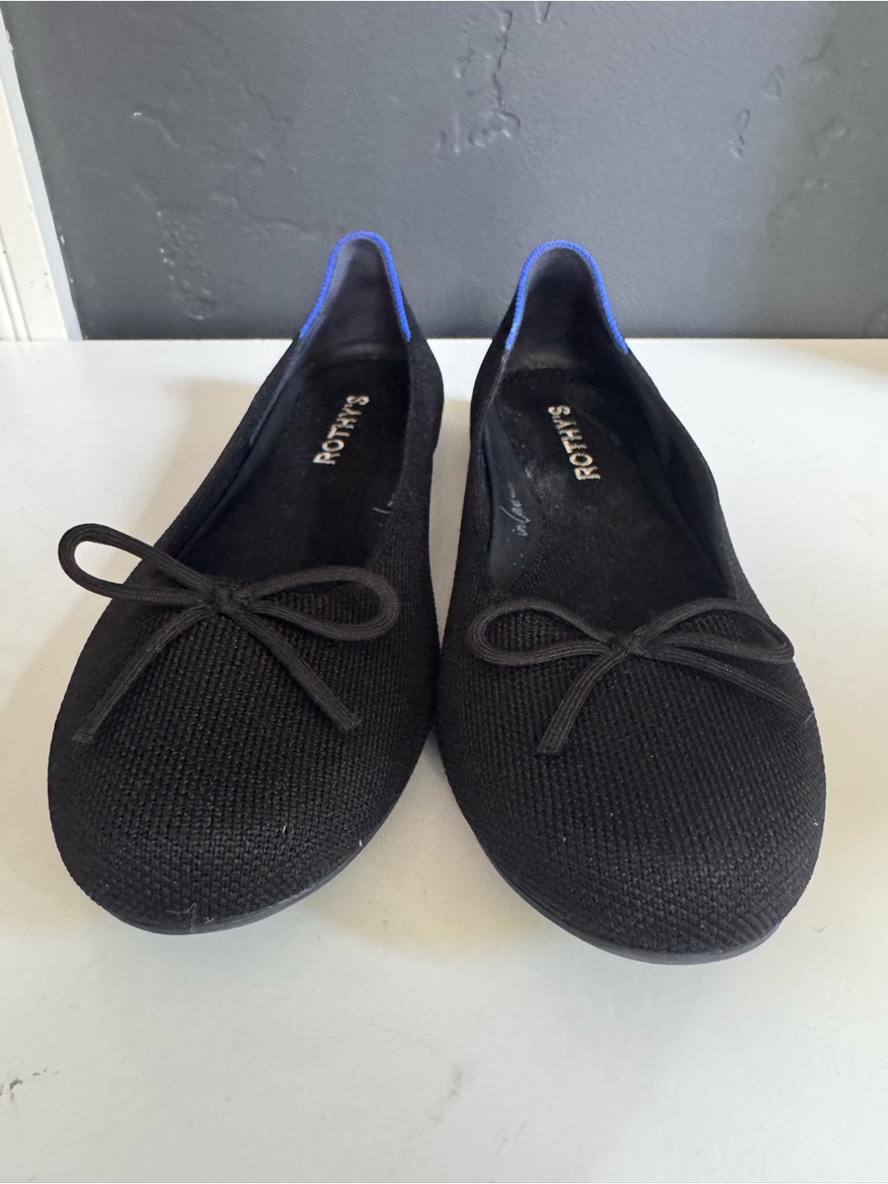 Rothy's Black Knit Ballet Flats with Blue Heel Trim